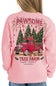 A person wearing a light pink crewneck sweatshirt, shown from the back. The sweatshirt features a large graphic print of a red vintage truck carrying Christmas trees, with the text 'PAWSOME' and 'TREE FARM simply southern COLLECTION'.