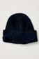 A dark navy blue knit beanie hat with a folded cuff, shown against a plain off-white background.