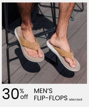 Promotional banner shows a man wearing tan men’s flip-flops on a chair outdoors, with “30% off” select stock; casual summer sale tone.