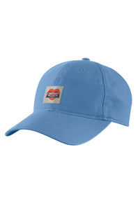 A light blue baseball cap with a small rectangular front patch featuring a red heart and the text 'Master Cloth. Carhart. Friends First. 1889'.