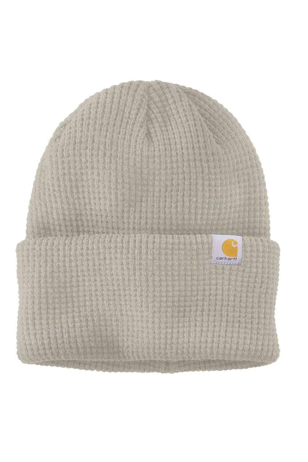 A light beige waffle-knit beanie hat with a small Carhartt logo patch on the front cuff, shown against a plain white background.