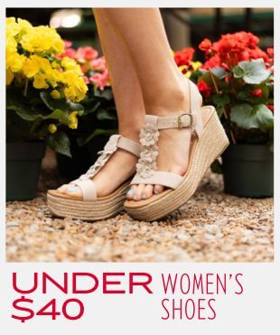 Person wearing open toe wedges with floral design in a garden setting with a promotional banner at the bottom that reads 'Under $40 Women's Shoes'