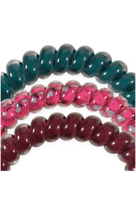 Three beaded stretch bracelets stacked together on a white background, featuring glossy dark teal, translucent pink with silver flecks, and deep burgundy beads.