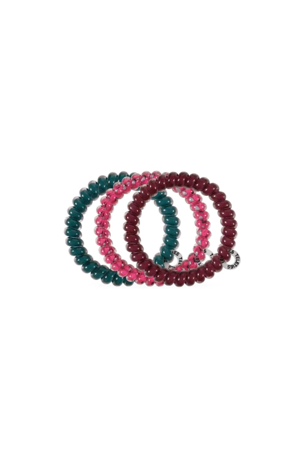 Three beaded stretch hair ties stacked together on a white background, featuring glossy dark teal, translucent pink with silver flecks, and deep burgundy beads.