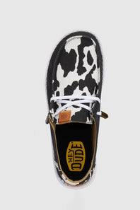 HEYDUDE Women’s Wendy Cow Print Shoes in Black/White