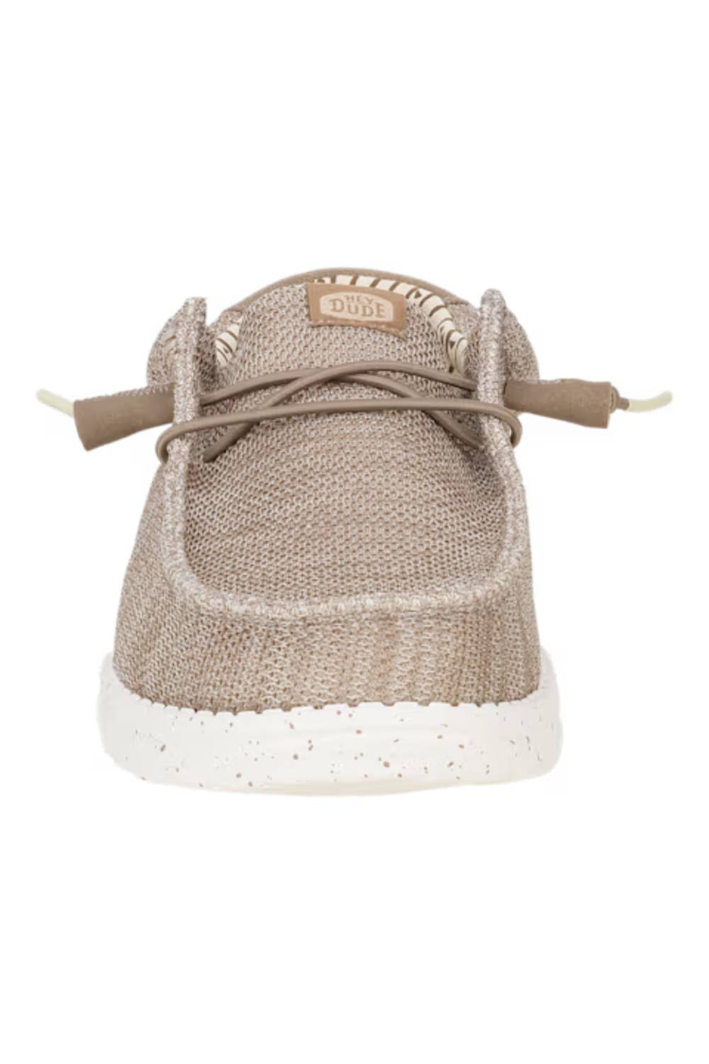 A single slip-on shoe with a textured beige woven upper, matching beige laces, and a speckled white sole, shown from a front-facing perspective on a white background.