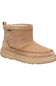 A single mid-calf suede boot in a light tan/beige color, featuring decorative stitching around the vamp and a thick matching sole, shown against a plain white background.