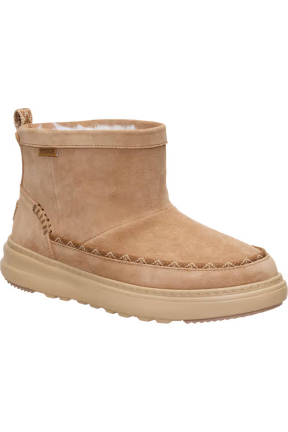 A single mid-calf suede boot in a light tan/beige color, featuring decorative stitching around the vamp and a thick matching sole, shown against a plain white background.