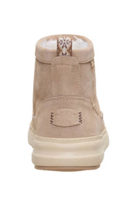 back view of A single ankle suede boot in a light beige or taupe color, featuring a thick cream-colored sole and decorative stitching along the vamp, shown against a plain white background.
