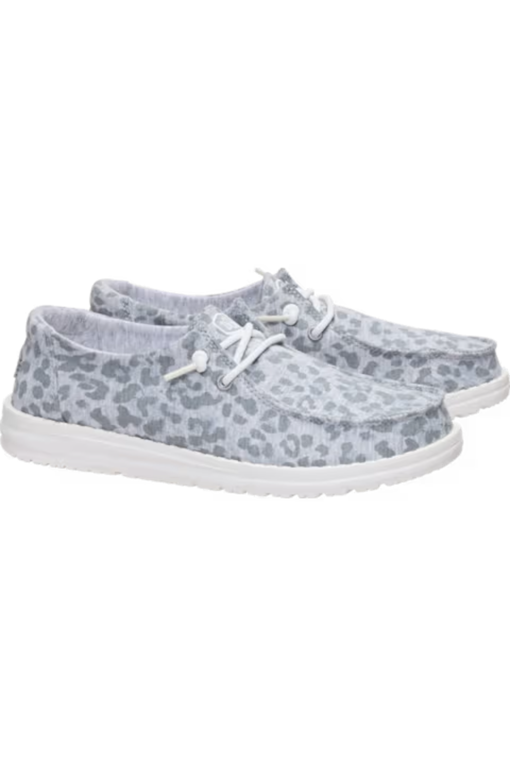 A pair of slip-on casual shoes with a gray and white leopard print pattern and white laces, shown against a plain white background.