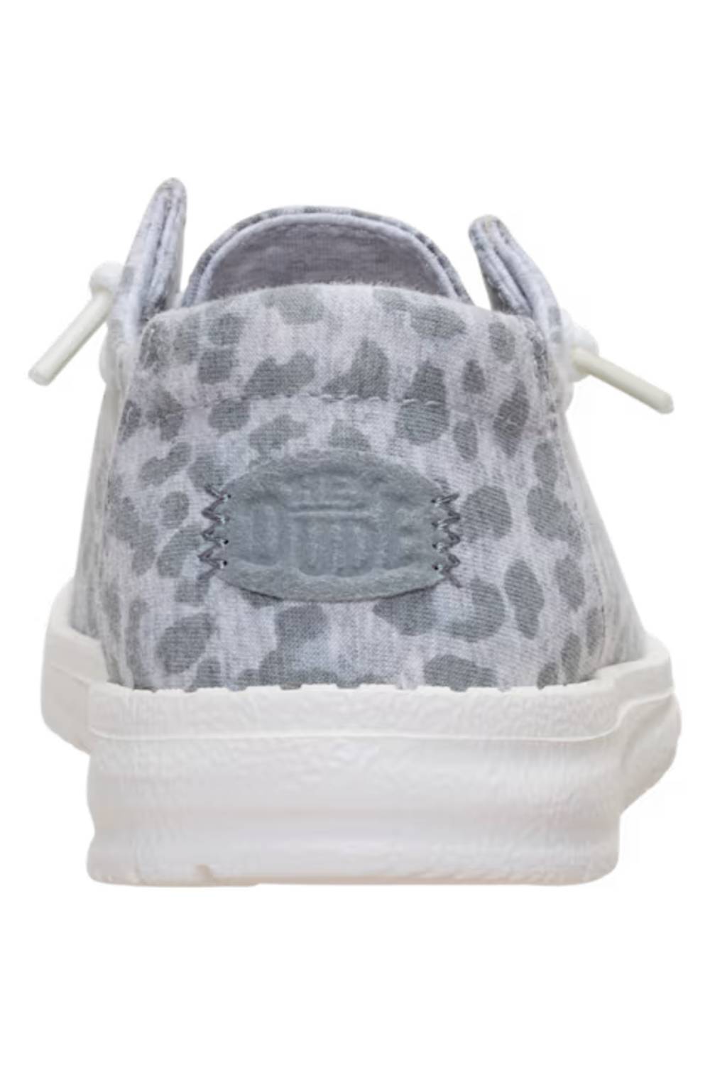A low-top canvas sneaker shown from the back, featuring a gray and white leopard print pattern on the upper, white laces, and a thick white rubber sole.