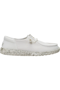 A white slip-on shoe with a textured mesh upper, matching white laces, and a chunky, speckled white sole, shown against a plain white background.