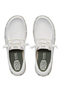 A pair of white mesh slip-on sneakers with gray and white distressed detailing on the soles, shown from a top-down view on a white background.