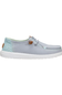 A light blue suede boat shoe with a textured light blue heel panel, white sole, and a small brown leather detail on the side.