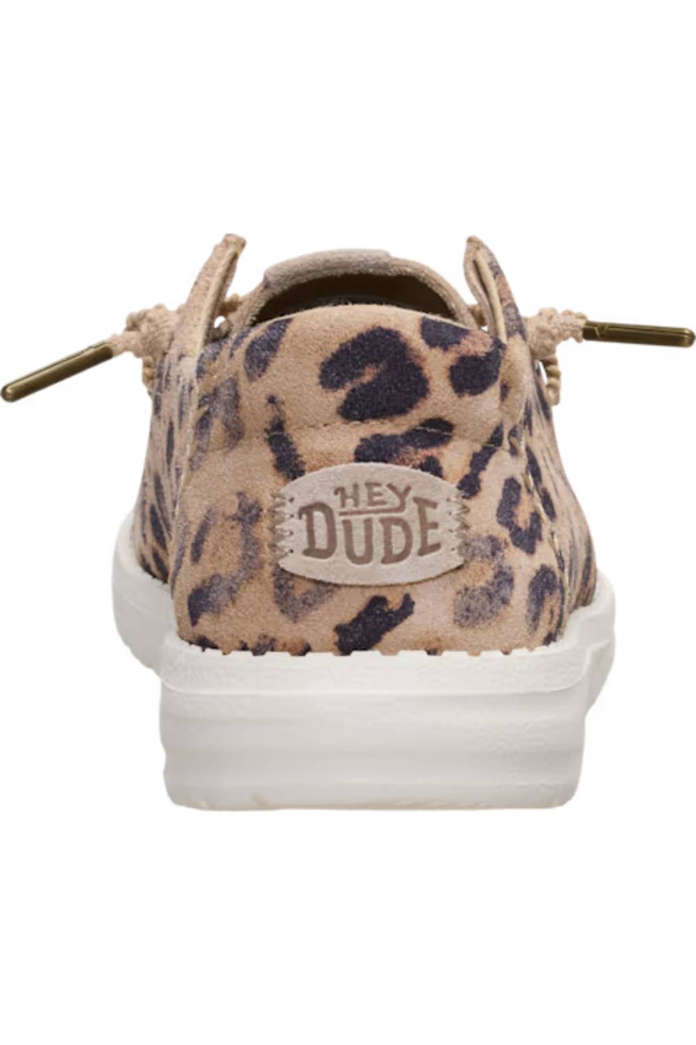 A single low-top sneaker shown from the back, featuring a beige and black leopard print upper with a white platform sole and a circular 'HEY DUDE' logo patch on the heel.