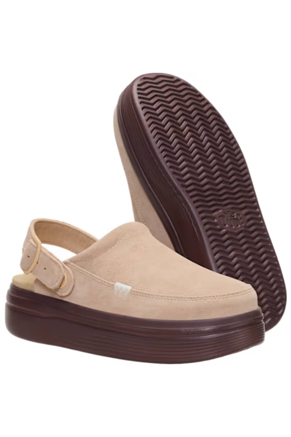 A pair of beige slip-on platform clogs with dark brown soles, with one shoe standing upright to show the sole tread and the other lying flat to show the top.