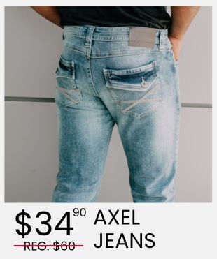 Person's backside shown wearing blue denim jeans with a promotion banner underneath that reads 
