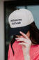 Put It On My Dad’s Tab Trucker Hat for Women in Black/Tan