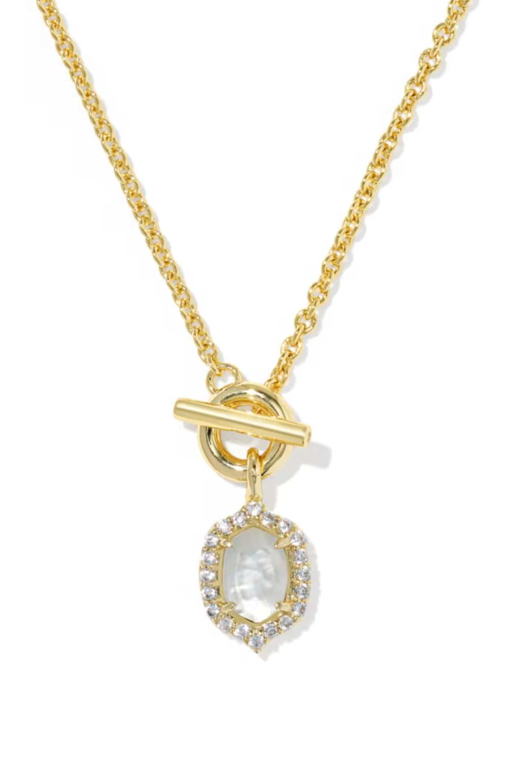 A gold chain necklace with a toggle clasp and a teardrop-shaped pendant featuring a white marbled center stone surrounded by small clear stones, shown on a white background.