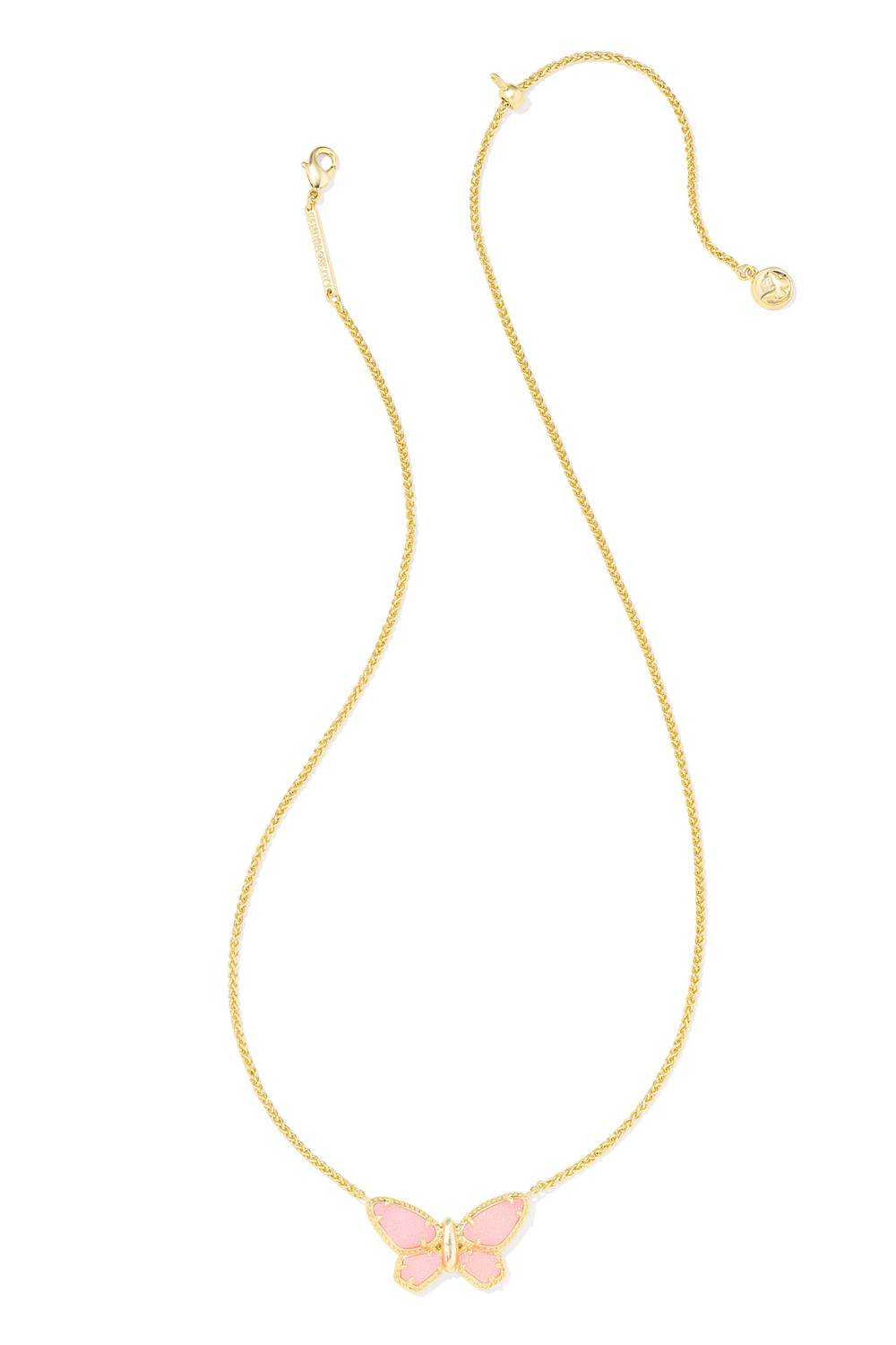 A delicate gold chain necklace featuring a small butterfly pendant with light pink enamel wings, displayed on a clean white background.