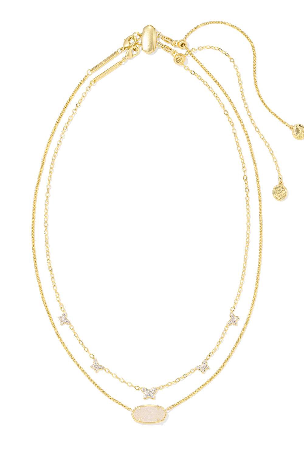 A delicate double-layered gold chain necklace with a small oval pendant, star charms, and butterfly details, displayed on a clean white background.