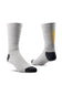 a pair of light grey socks with black heel and toe and a vertical yellow Ariat logo on the back on a all white background