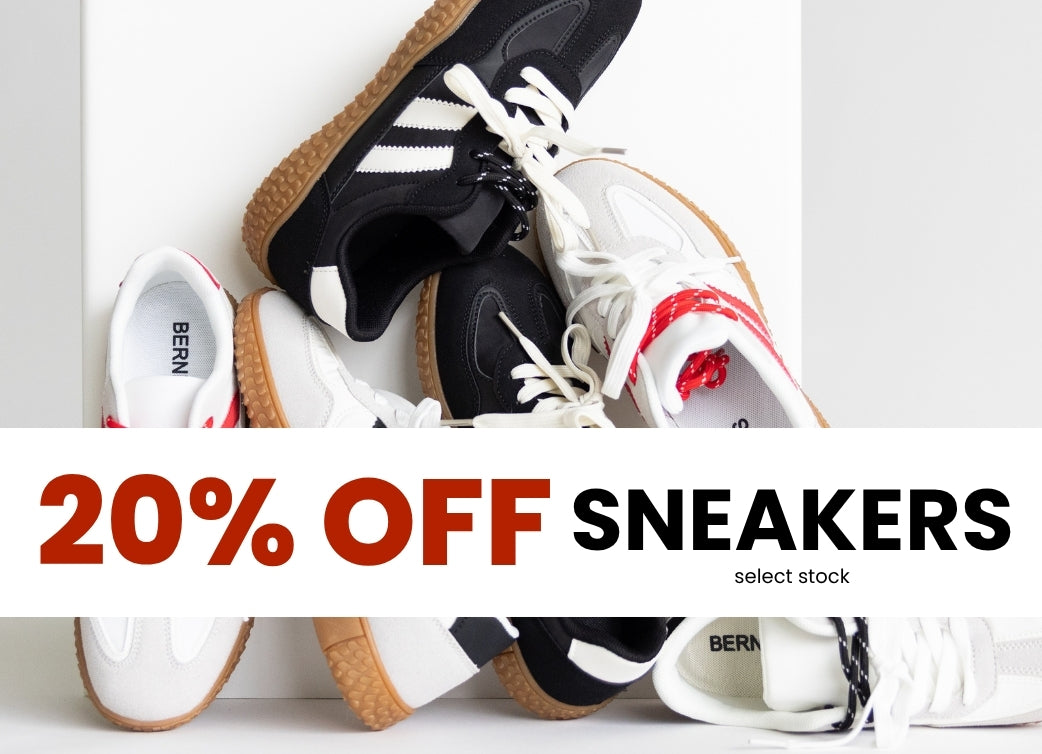 Promotional graphic of different sneakers propped up together against a white pedestal with thick white stripe through the image with text that reads 20% OFF SNEAKERS select stock 