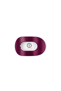 A Teleties clip with a white center and black logo, shown on a plain white background.
