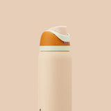 Owala FreeSip 32oz Stainless Steel Water Bottle in Tan