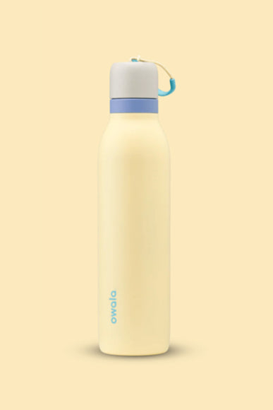 Owala FreeSip Twist 24oz Stainless Steel Water Bottle in Restful Yellow