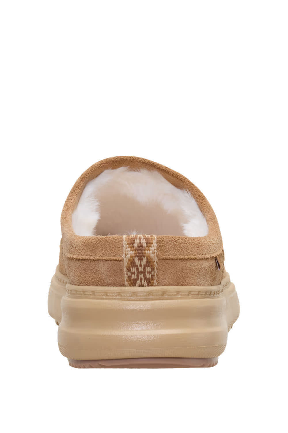 A single tan slip-on clog-style shoe with a plush white shearling lining and a thick tan sole, shown from the back against a white background.