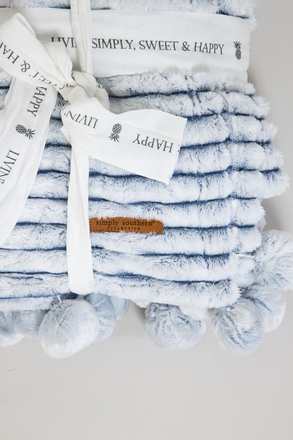 Blue pom pom throw best sale