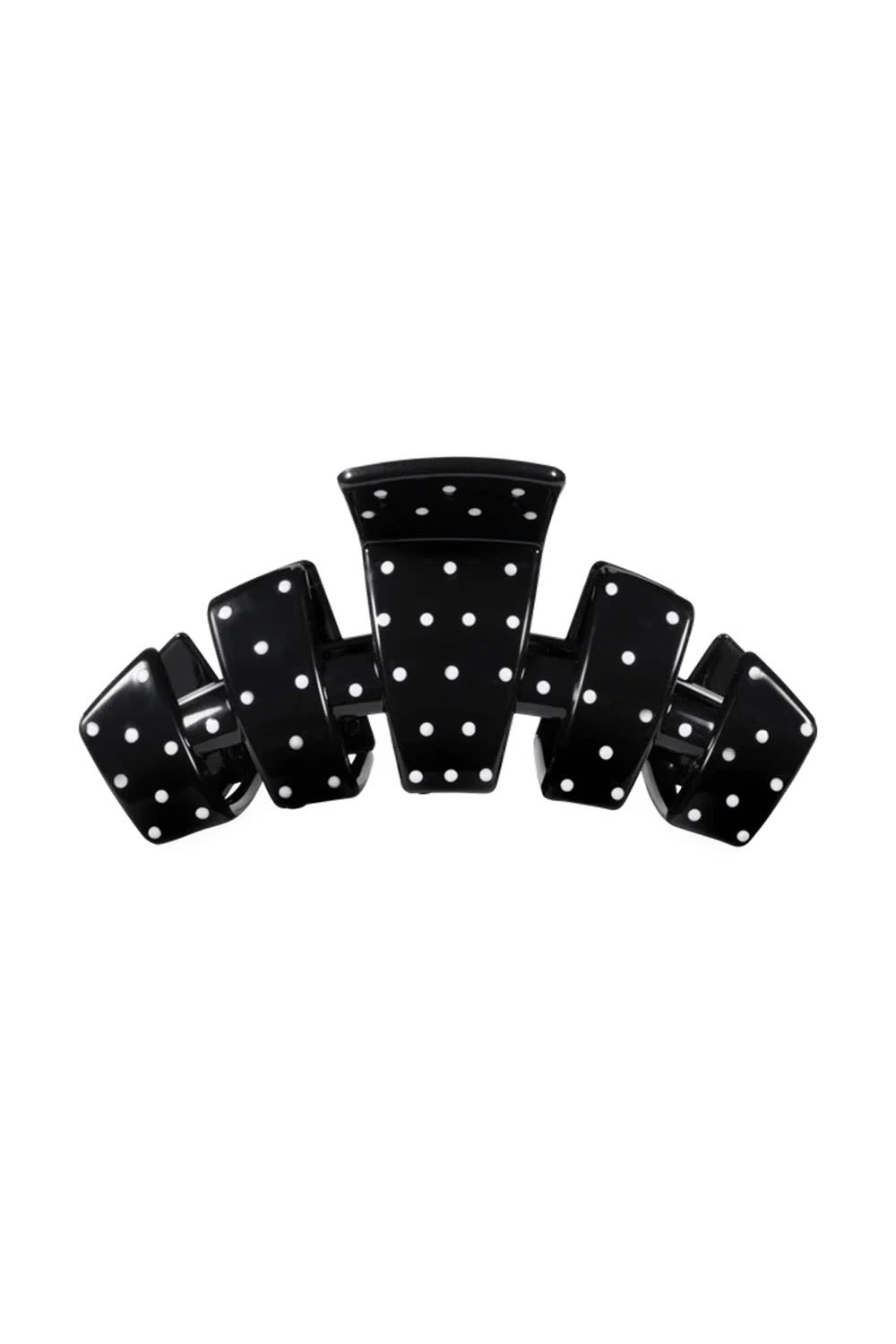 A glossy black claw hair clip with white polka dots, displayed against a solid white background.