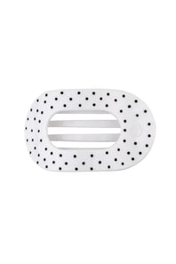 A white hair claw clip with a black polka dot pattern shown on a plain white background.