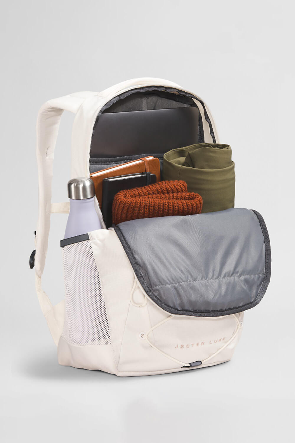 The North Face Jester Backpack for Women in Gardenia White/Burnt Coral Metallic