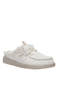 A single white quilted slip-on shoe with faux fur lining and matching laces, shown against a plain white background.