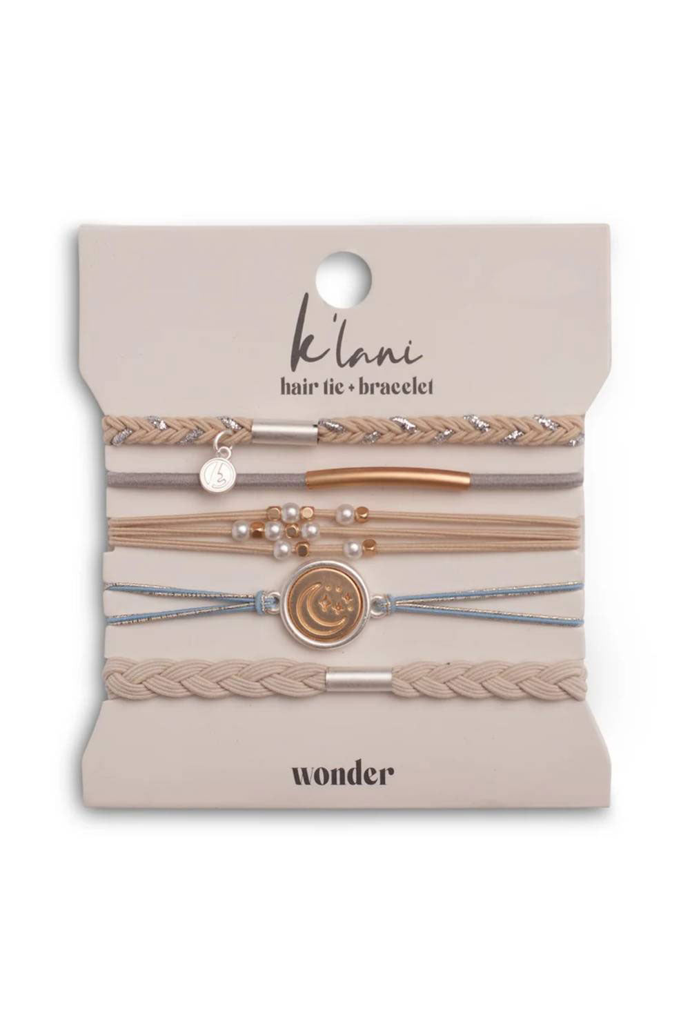A 5-piece K'lani Wonder hair tie and bracelet set in the 'medium' size, displayed on its original beige backing card. The set includes woven beige and light brown elastic bands, thin metallic rose gold and silver chains, and delicate pearl-bead strands.