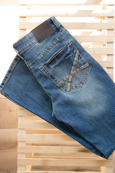 Premium Photo | Gray jeans pocket closeup on gray jeans background