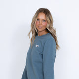 The North Face Heritage Patch Crewneck Sweatshirt for Women in Goblin Blue