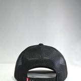 Kimes Ranch Weekly Trucker Hat in Black 